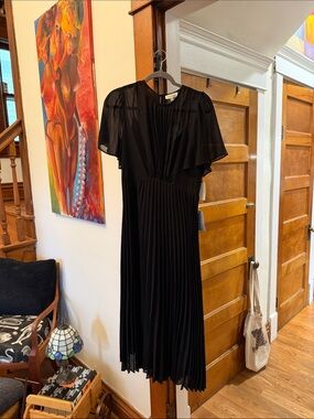 Flowing Black Pleated Midi Dress with Sheer Flutter Sleeves